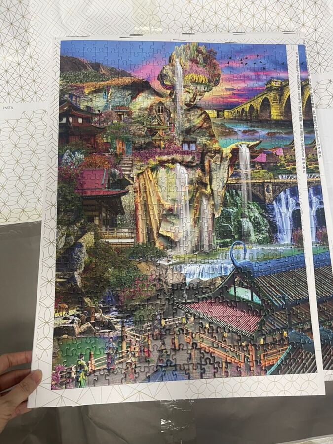 An assembled sample of the Enchanted Falls puzzle, showing the cut pieces.