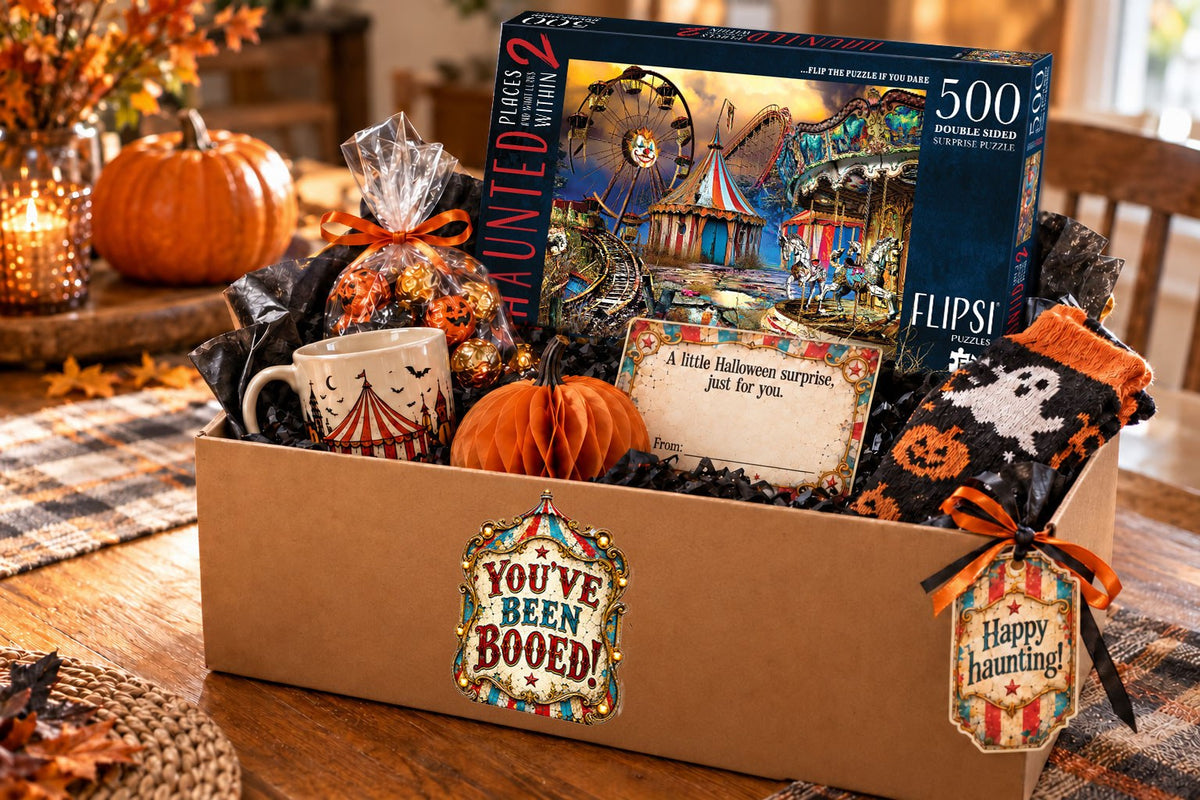 A boo basket with a Haunted Places 2 Flipsi puzzle, chocolates, a circus mug, ghost socks and the Boo Kit's 'You've been booed!' label, note card and gift tag