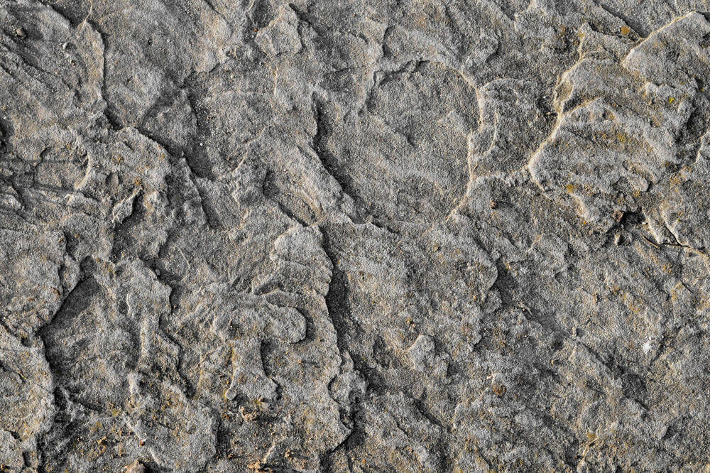 Source photograph: a close grey stone texture.